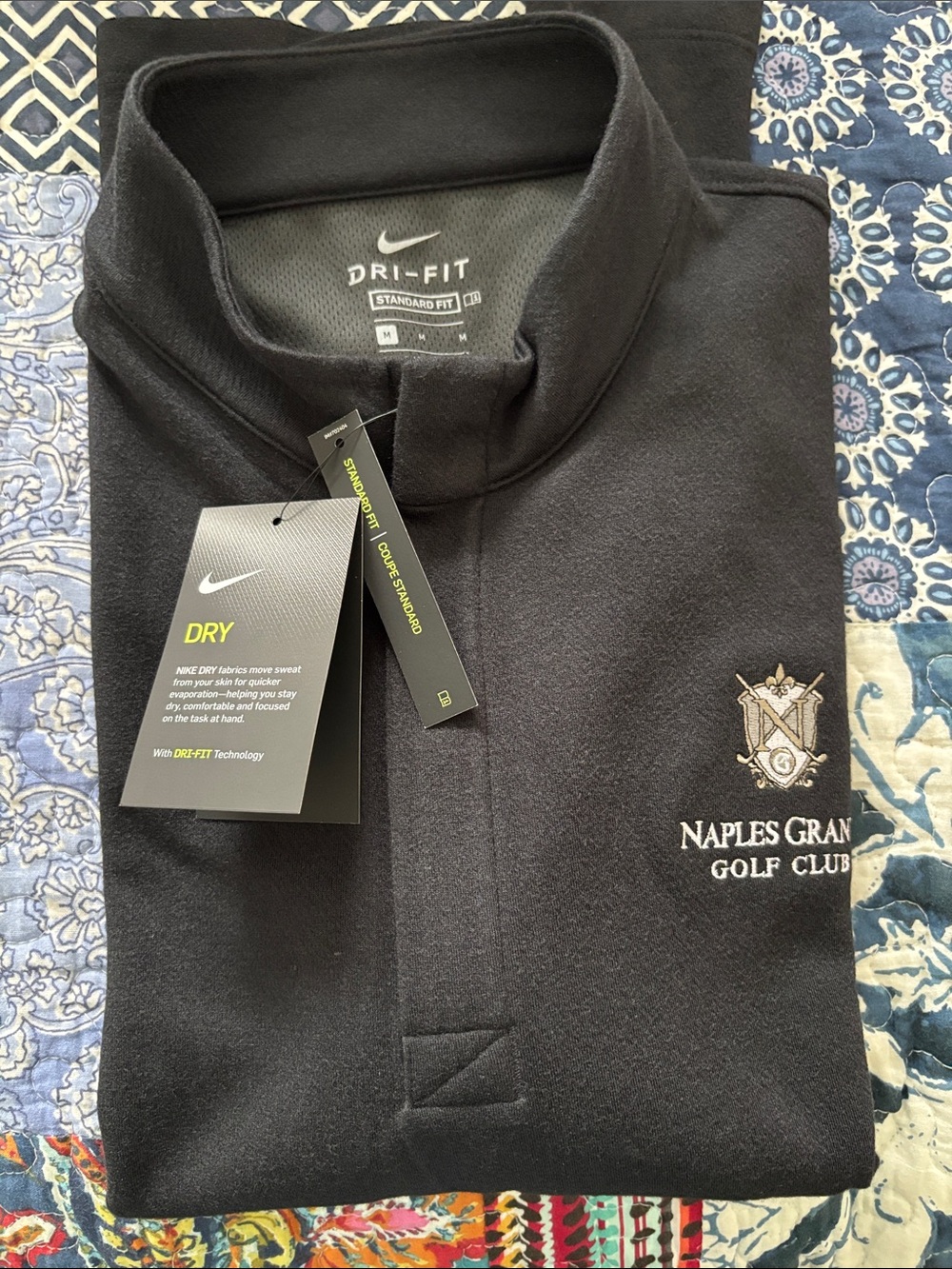 Nike Dri-FIT quarter-zip pullover featuring the embroidered logo NWT